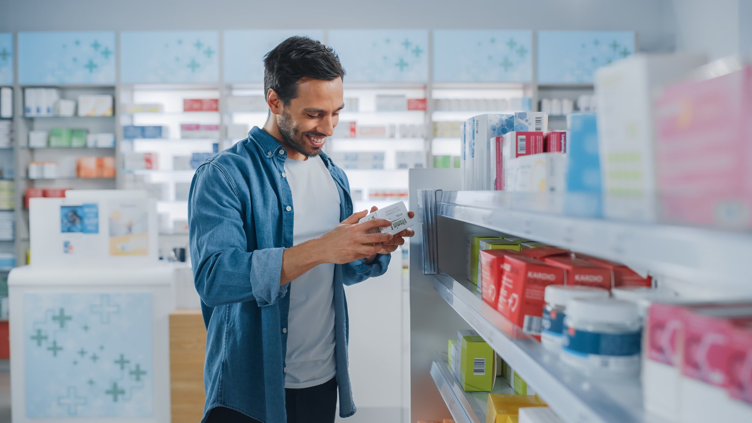 Man at the pharmacy getting medication for a cough